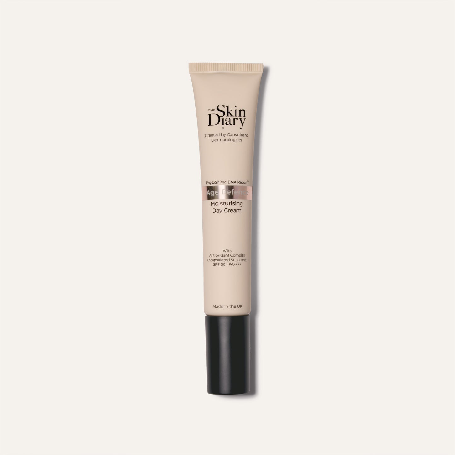A tube of The Skin Diary Moisturising Day Cream on a clean white background. The tube is beige with a black cap, and the brand name 'The Skin Diary' is printed in black on the front.